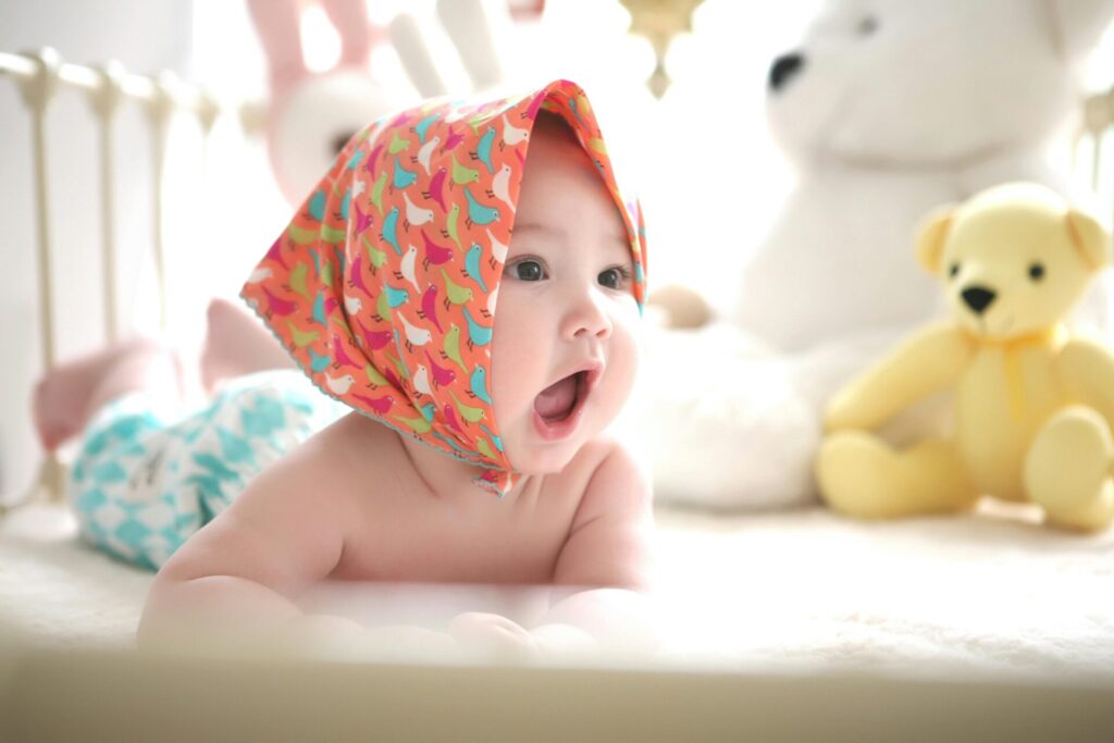a baby with a hood on