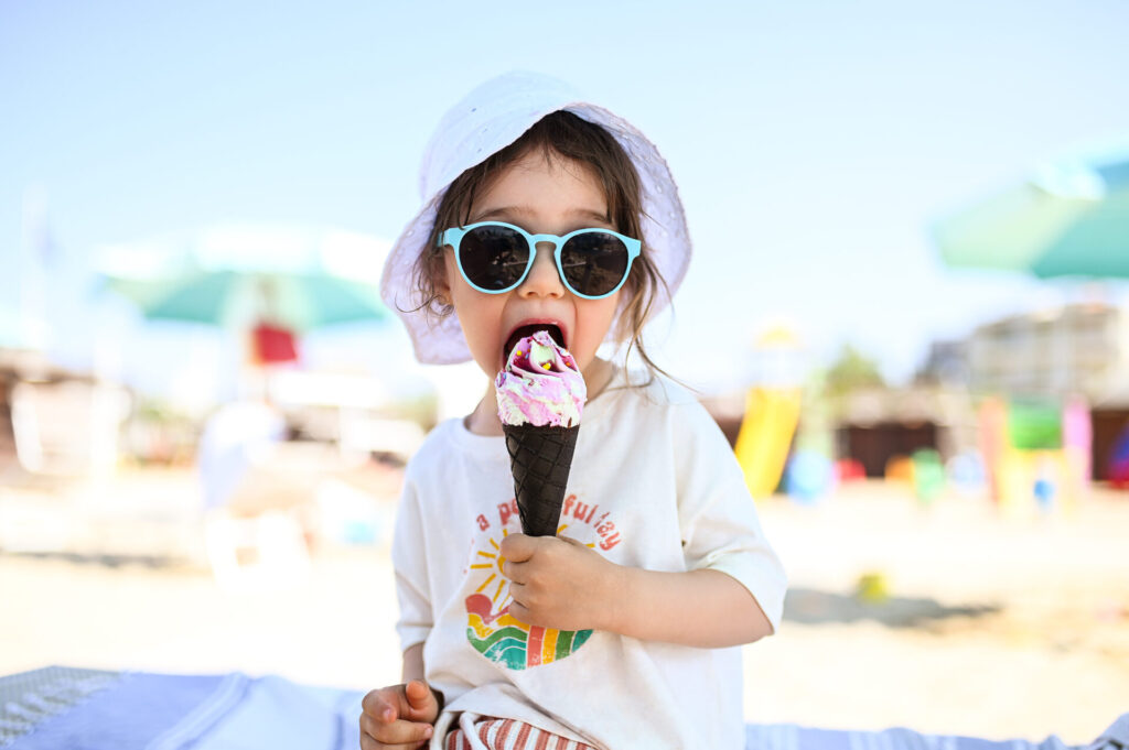 a child eating an ice cream cone