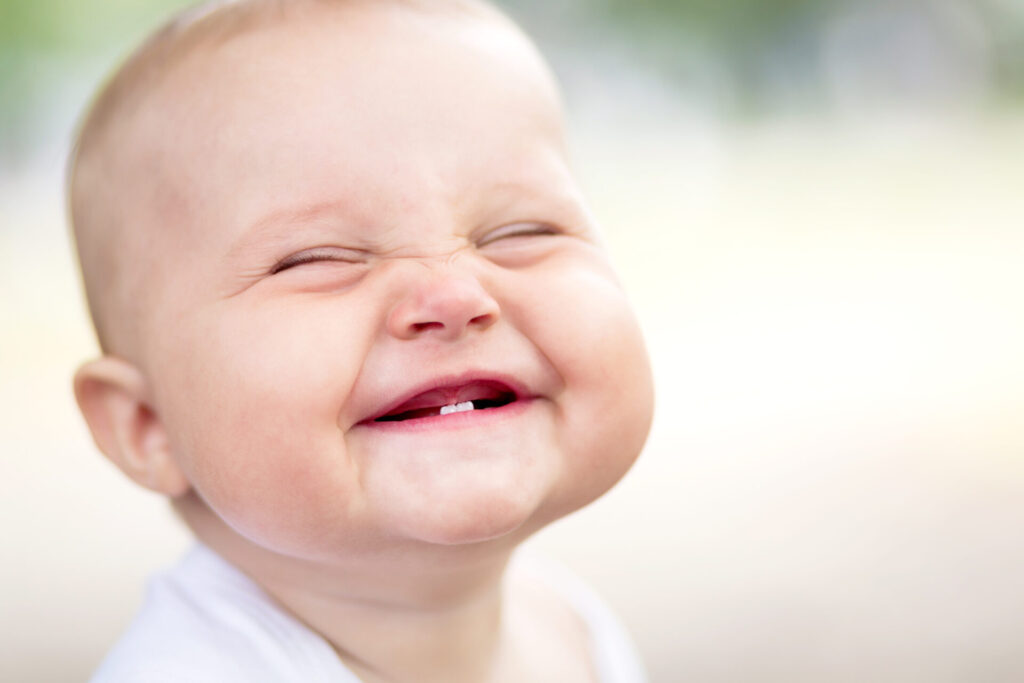 a baby with a smile